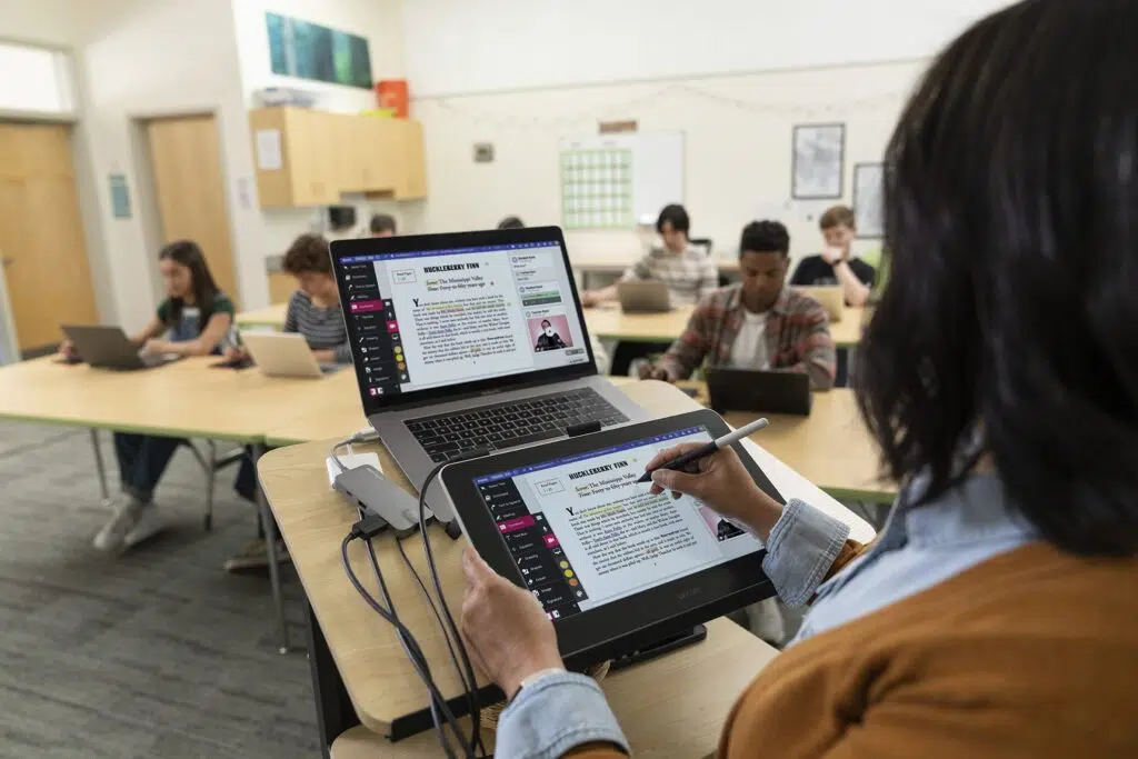 teacher using wacom technology to teach