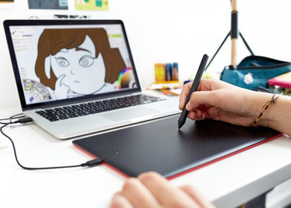 One by Wacom pen tablet and Macbook