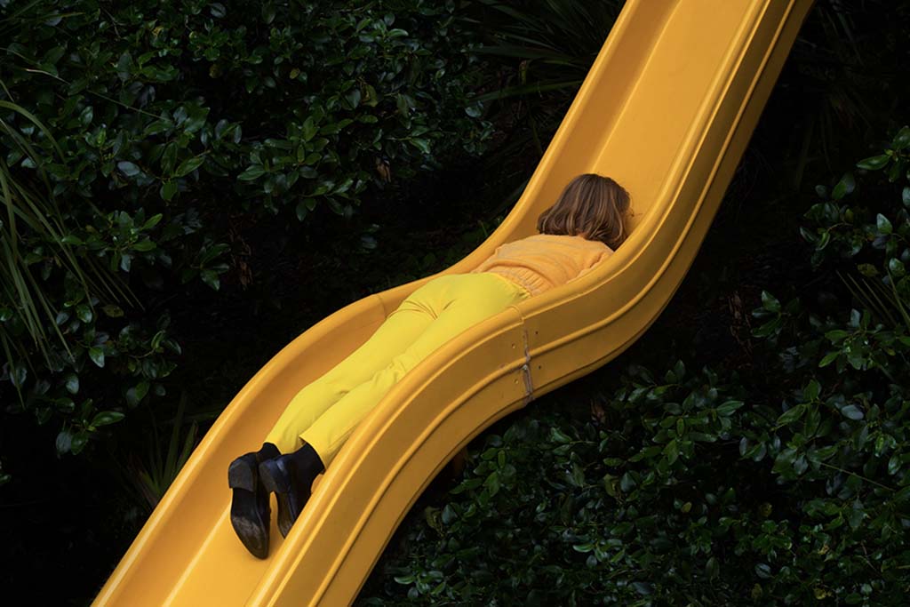 Ben Zank on a yellow slide